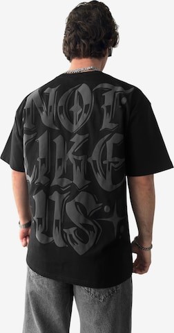 T-shirt 'Oversize Not Like Us T-shirt - Black' Kleidermafia en noir : devant