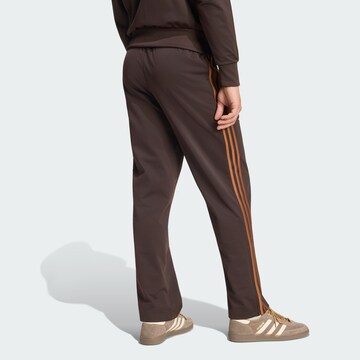 regular Pantaloni 'Firebird' di ADIDAS ORIGINALS in marrone
