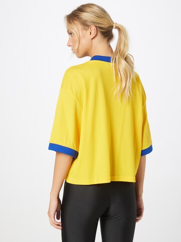 ADIDAS ORIGINALS Тениска 'Adicolor 70S ' в жълто