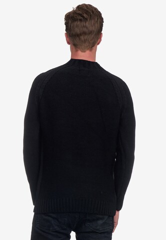 Rusty Neal Pullover in Schwarz