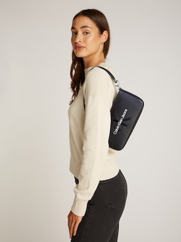 Sac bandoulière Calvin Klein Jeans en noir