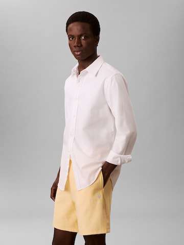 Regular Pantalon 'Terry' Calvin Klein Jeans en jaune