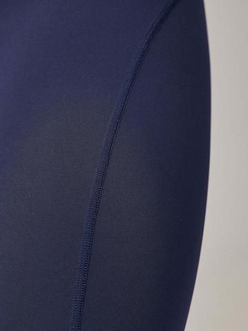 SNOCKS Skinny Sportbroek in Blauw