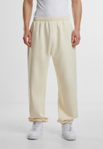 Tapered Pantaloni di Urban Classics in beige