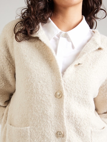 Cardigan Cartoon en beige