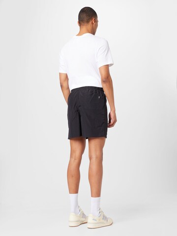 MARKET Regular Shorts 'Smiley' in Schwarz