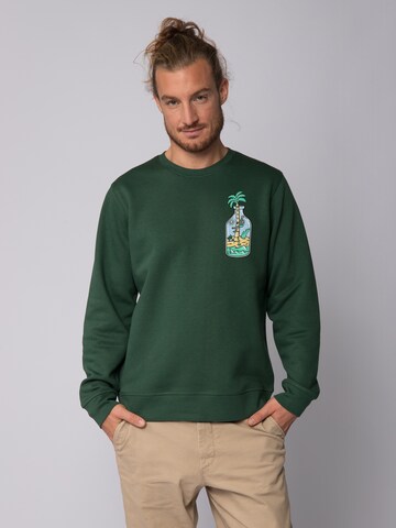 Watapparel Sweatshirt 'Holiday in a bottle' in Green: front