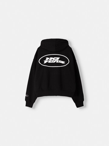 Bershka Tréning dzseki 'NO FEAR' - fekete