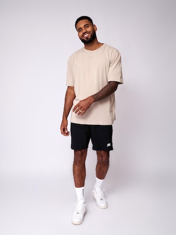 Fortex Fitness Regular Sporthose 'Essential' in Schwarz