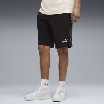 Regular Pantalon de sport 'Essentials' PUMA en noir : devant