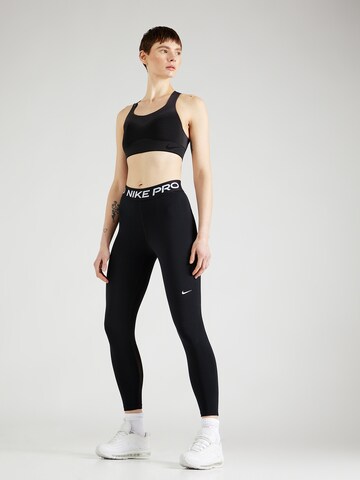 NIKE Skinny Spodnie sportowe 'NP 365' w kolorze czarny