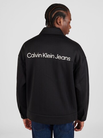 Calvin Klein Jeans Přechodná bunda 'INSTIT' – černá