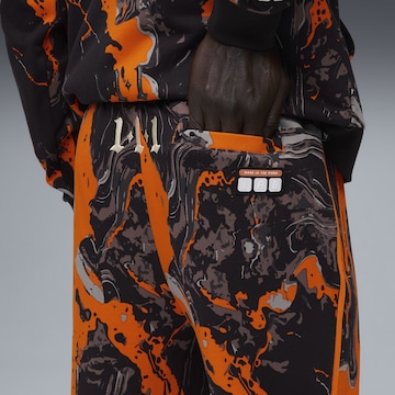 Loosefit Pantalon de sport 'Lafrancé Heem Era' PUMA en orange