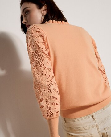 Pull-over Apricot en orange