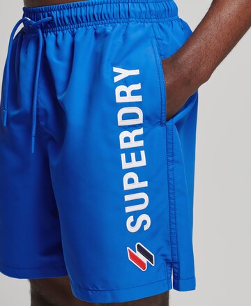 Superdry Plavecké šortky – modrá