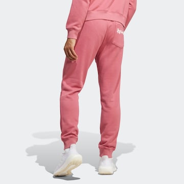 ADIDAS SPORTSWEAR Tapered Workout Pants 'FC Arsenal Chinese Story' in Pink