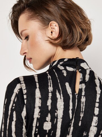 Robe ' ' Apricot en noir