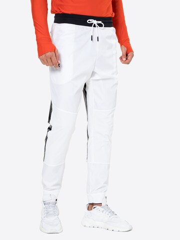 Regular Pantalon de sport UNDER ARMOUR en blanc : devant