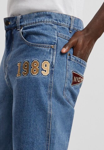 regular Jeans di Karl Kani in blu