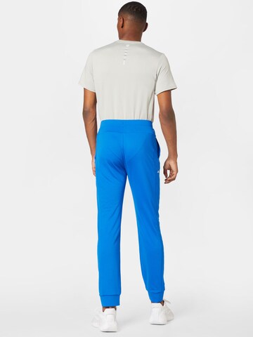 Tapered Pantaloni sportivi di J.Lindeberg in blu