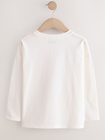 T-Shirt Next en blanc