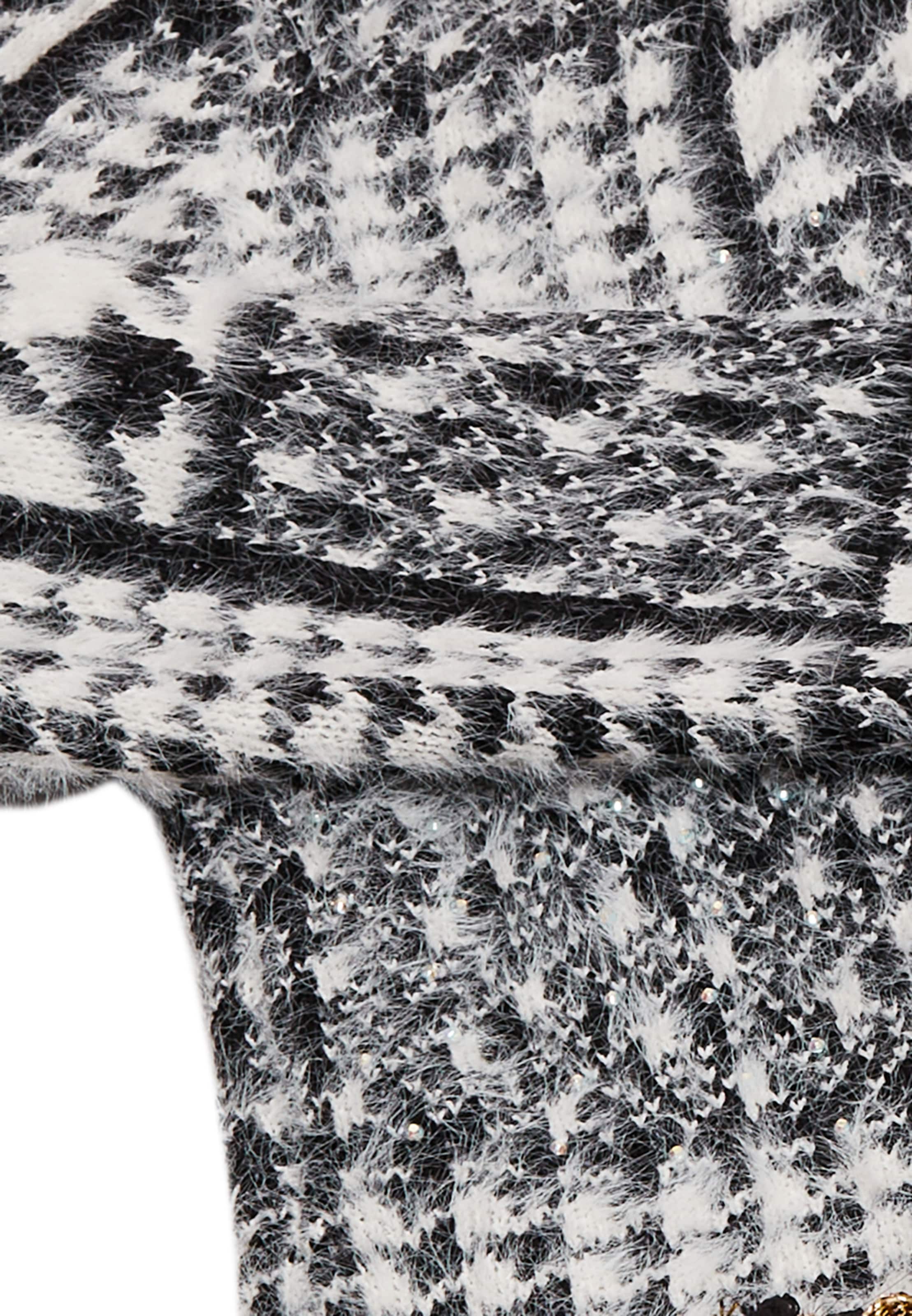 faina Neuletakki värissä musta