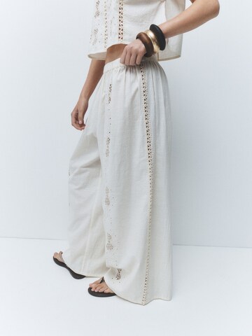 Next - Pierna ancha Pantalón en beige