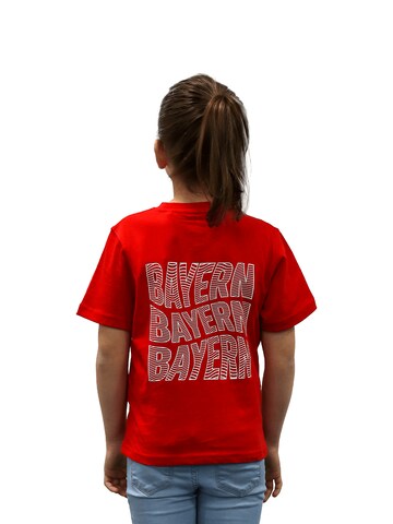 FC BAYERN MÜNCHEN Shirt 'Bayern Essentials' in Red: front