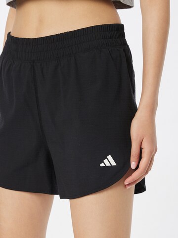ADIDAS PERFORMANCE Regular Workout Pants 'Run Icons Made With Nature' in Black