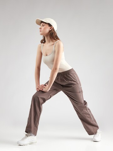 Girlfriend Collective Sports bodysuit in Beige