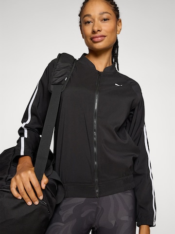 Vestes d’entraînement 'FLORAL RIBBON' PUMA en noir