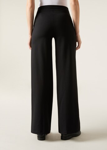 CALZEDONIA Wide Leg Hose in Schwarz