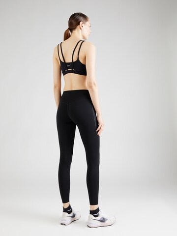 NIKE Skinny Sportbroek 'UNIVERSA' in Zwart