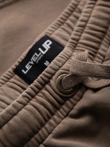 Ombre Loosefit Sporthose‌‌‌‌‌‌‌‌‌‌ in Braun