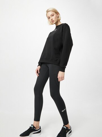 Sweat de sport aim'n en noir