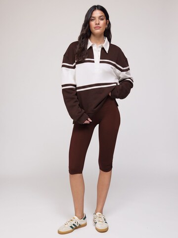 Osia Shirt 'OSIA' in Bruin: voorkant