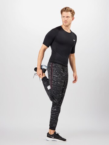 NIKE Regular Fit Funktionsskjorte 'ONE' i sort