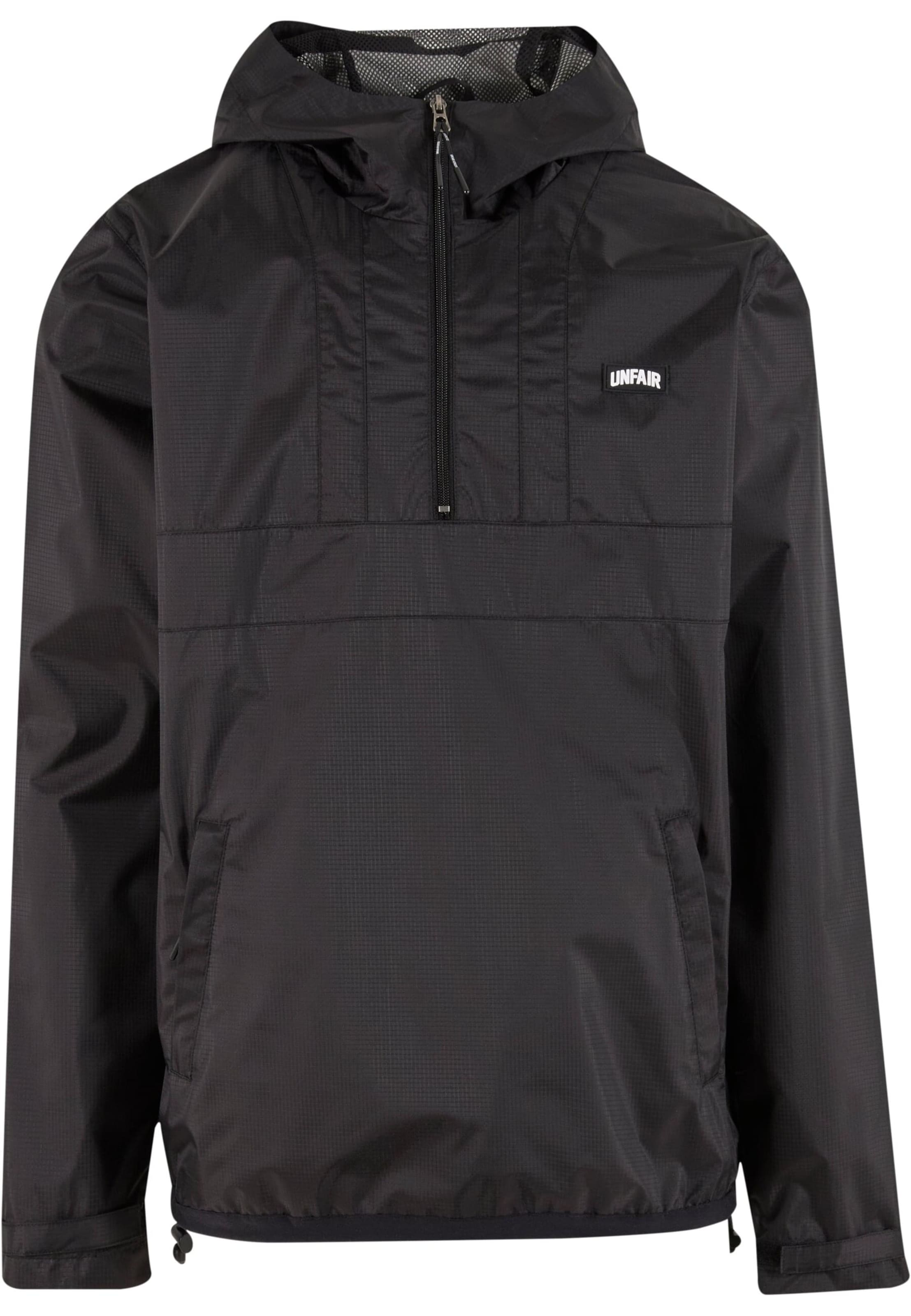 Unfair Athletics Between-season jacket in Black: front