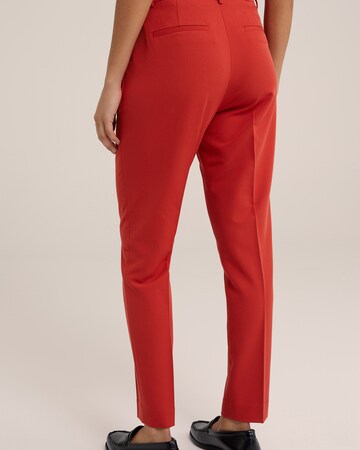 WE Fashion Slimfit Suorat housut värissä punainen
