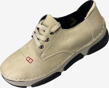 Chaussure à lacets Kumixi en beige : devant