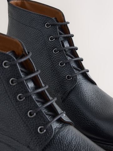 Next - Botas con cordones en negro