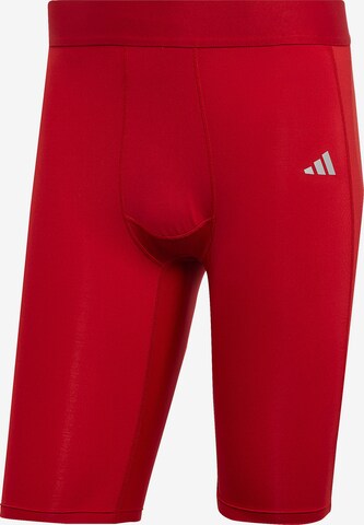 ADIDAS PERFORMANCE Workout Pants in Red: front