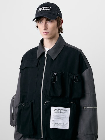 KARL LAGERFELD JEANS Prehodna jakna 'ATELIER' | črna barva