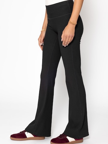 SASSYCLASSY Flared Leggings‌‌‌‌‌‌‌‌‌‌ in Schwarz