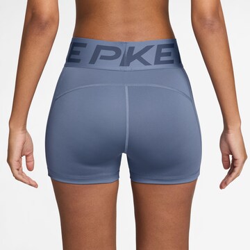 NIKE Skinny Sporthose in Blau