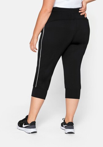 SHEEGO - Tapered Pantalón en negro