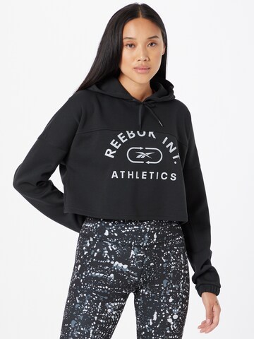 Sweat de sport Reebok en noir : devant