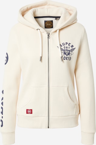 Veste de survêtement Superdry en beige : devant