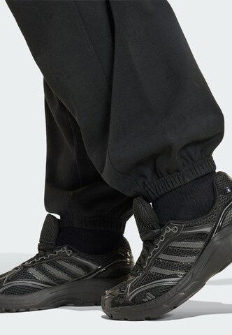 ADIDAS SPORTSWEAR - Tapered Calças de desporto em preto