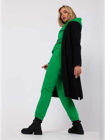 made of emotion - Tapered Pantalón en verde